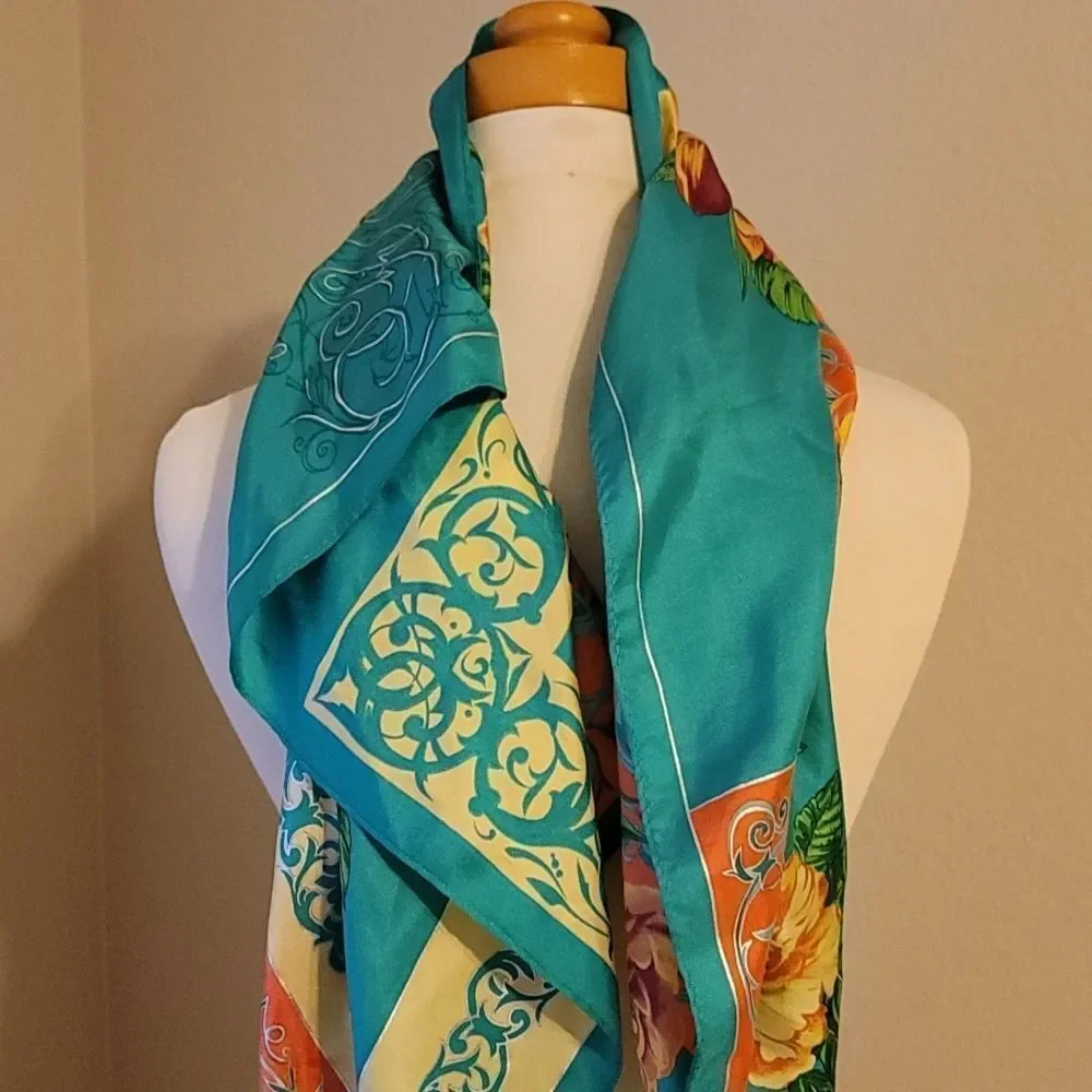 Set of silk Ellen Tracy and pierre cardin scarfs.